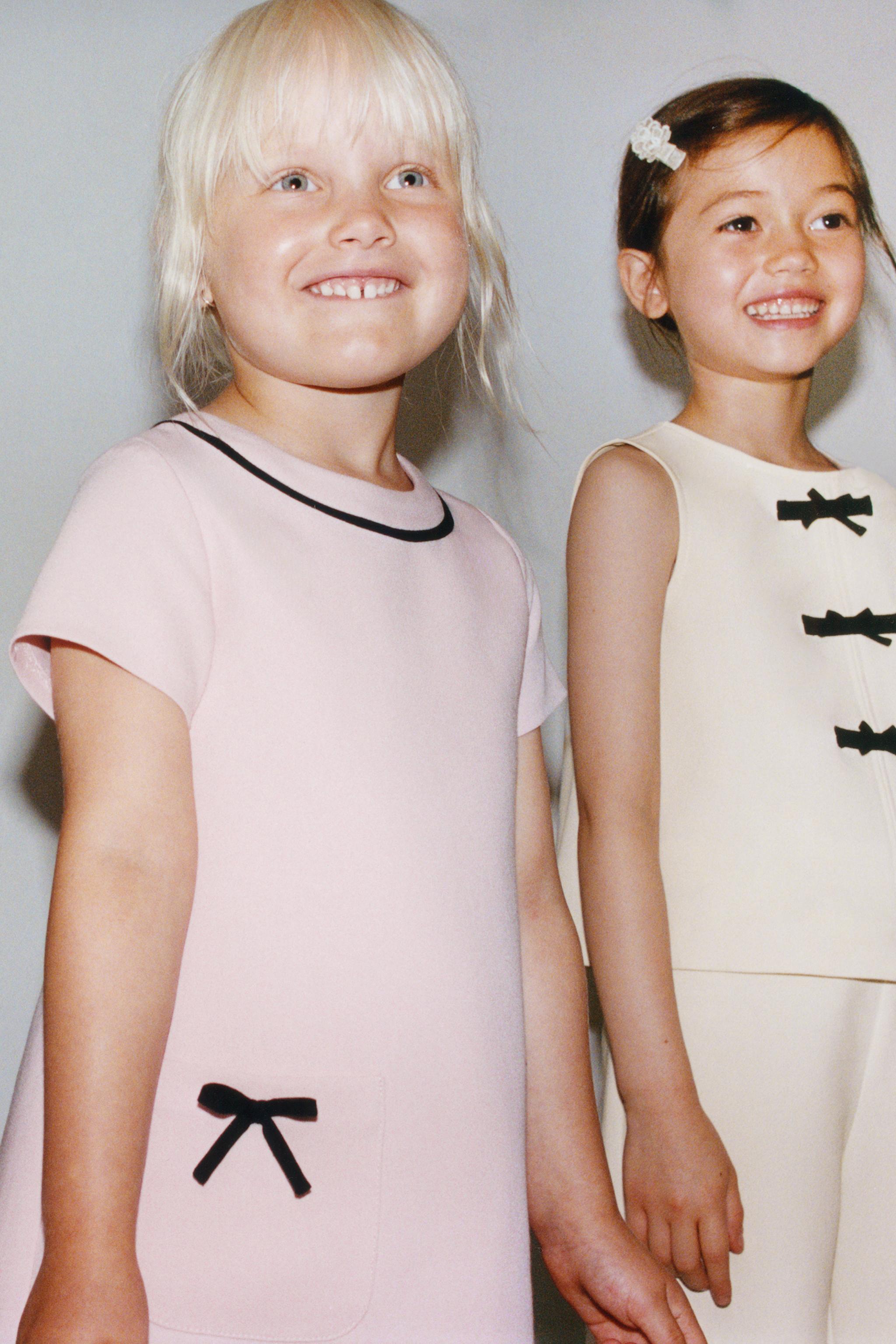 CONTRAST PIPING AND BOW DRESS